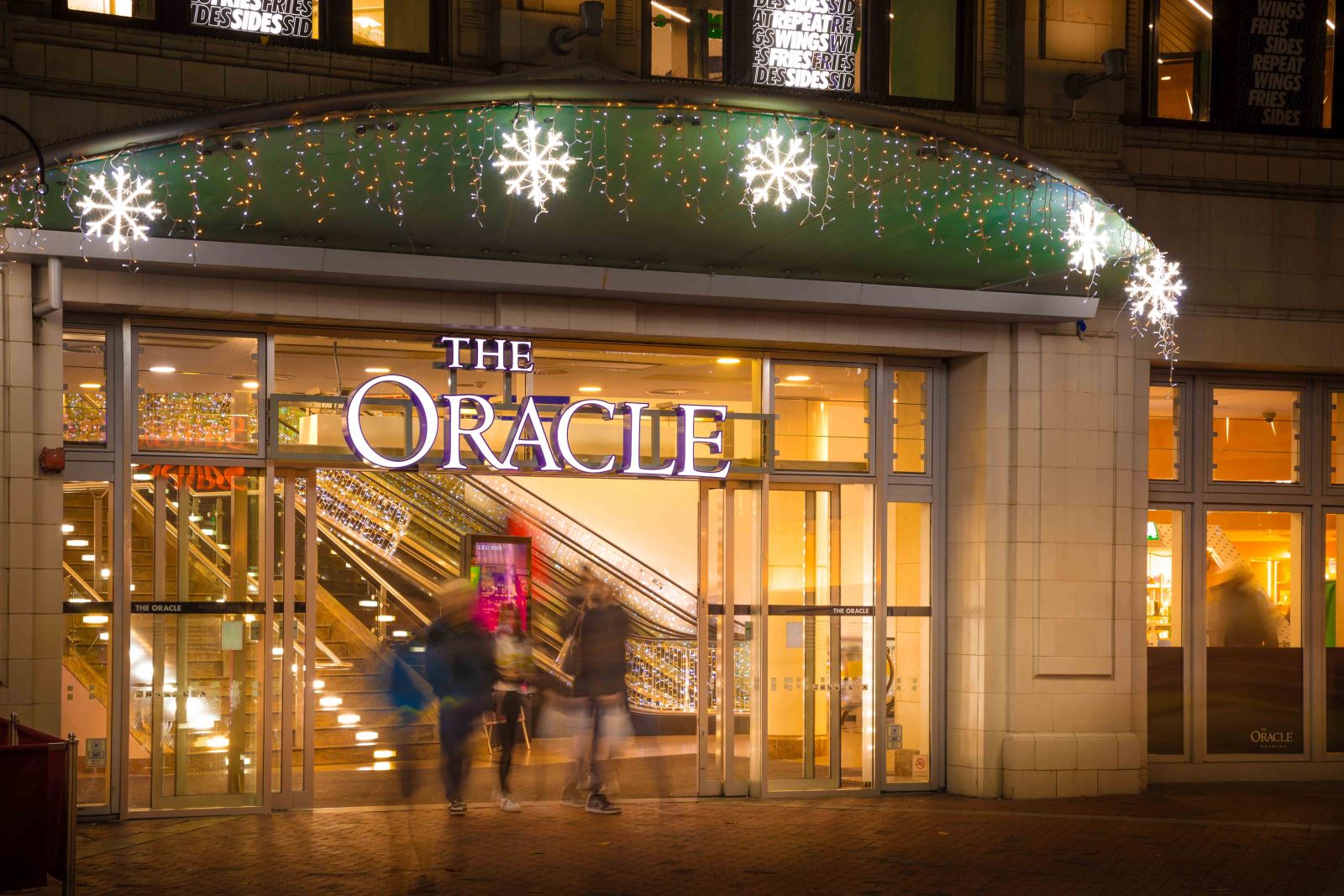 The Oracle shopping centre lit up with Christmas lights